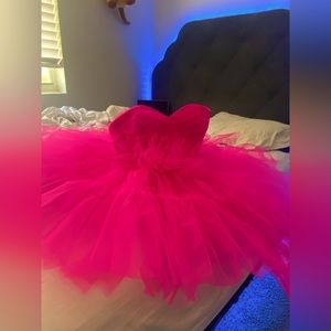 This is a size 10 dress RUNS SMALL. Brand new Never been worn.